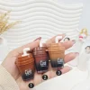 تینت لب و گونه قهوه ای طرح آیس پک نوشیدنی برند HUDA MATTE ΜΕ کد 523تینت لب و گونه قهوه ای طرح آیس پک نوشیدنی برند HUDA MATTE ΜΕ کد 523